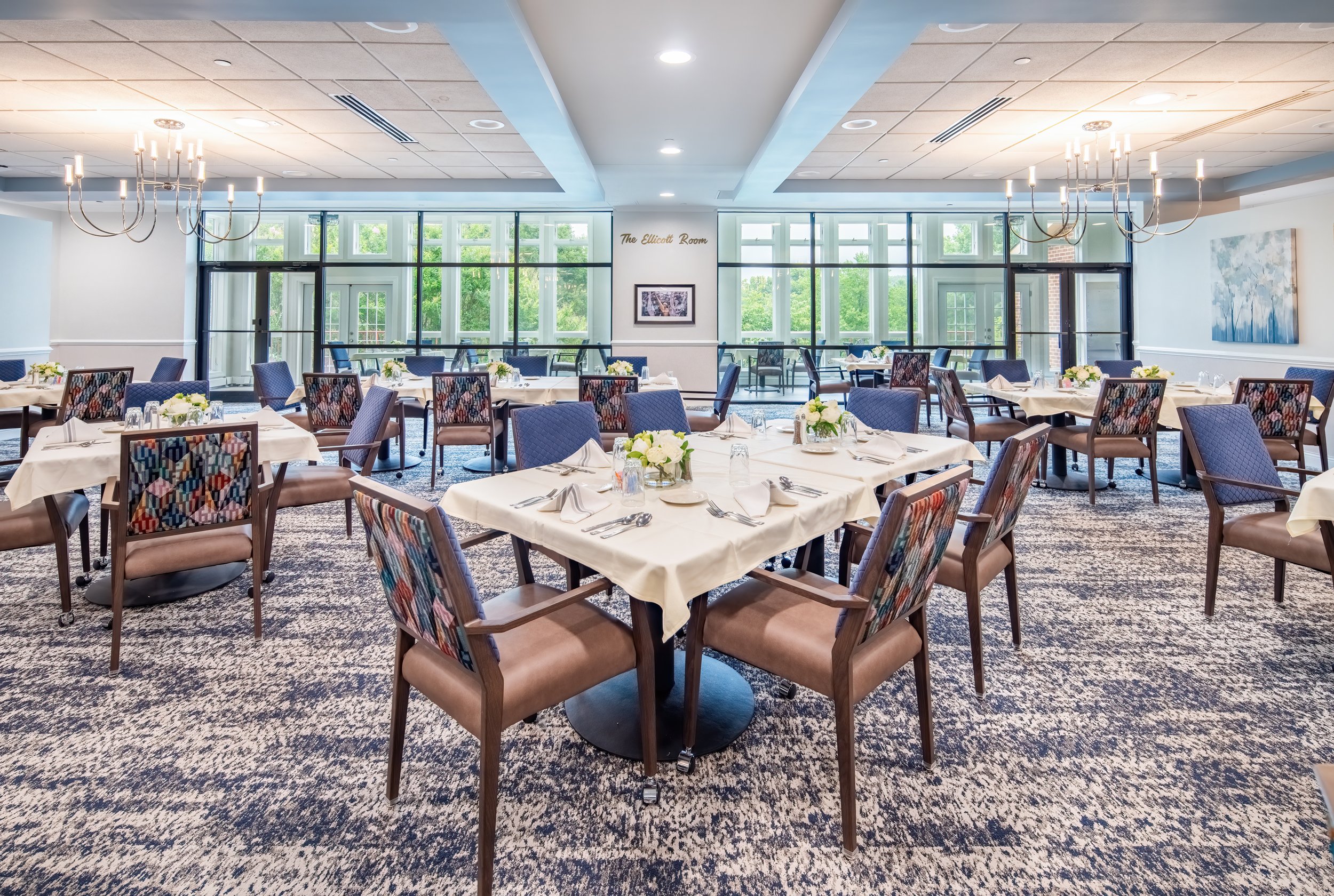 HeartLands Senior Living at Ellicott City common area fireplace dining 