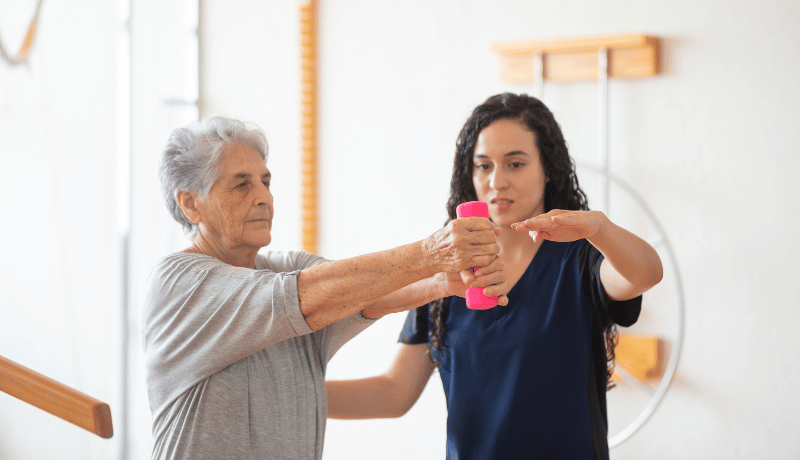 resident and caregiver exercising