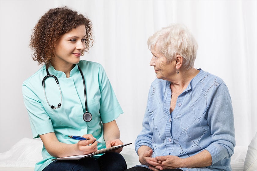 doctor-examining-elderly-woman